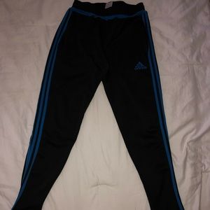 black on black adidas track pants
